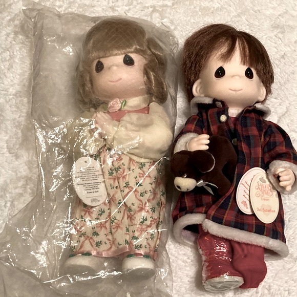 Pair Of Precious Moments Dolls